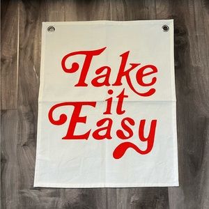 Urban Outfitters take it easy wall flag